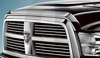 Chrome bonnet protector for RAM 2500 and 3500 trucks by Geared for Adventure, showing the shiny chrome finish on the vehicle's hood.