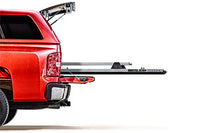 BedSlide AXS heavy-duty bed slide for Ram 1500 5'7" with Ram Boxes, showing durable construction and installation in truck bed.